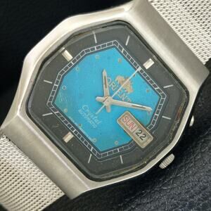 Vintage 1971 Orient Automatic Mens Silver Watch W/daydate & Blue accents